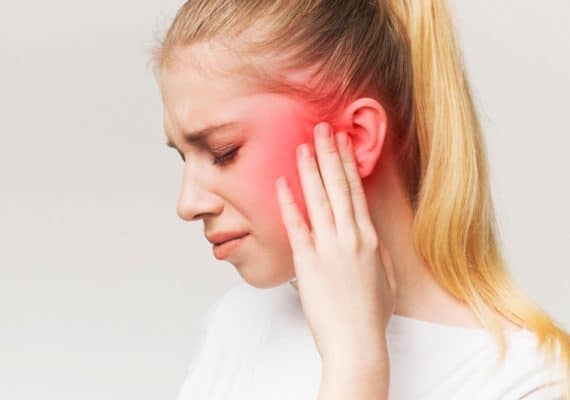 How do I stop my ears from hurting in the winter?