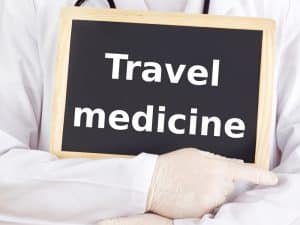 What routine vaccinations are required for an international trip?